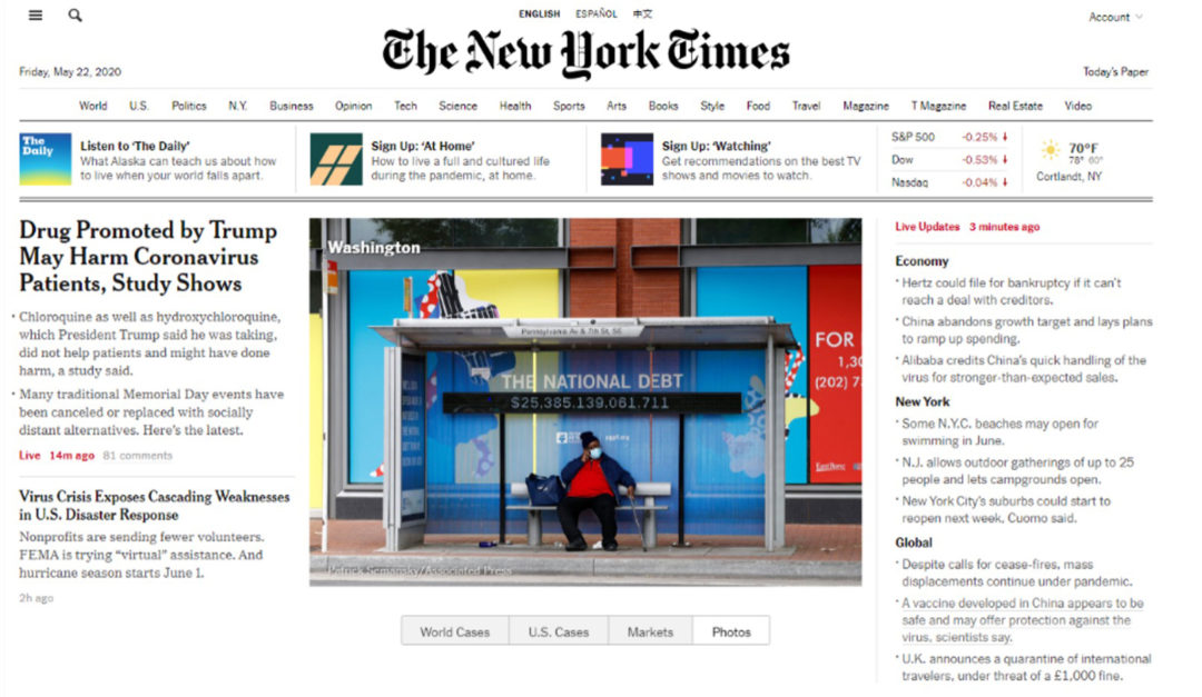New York Times cover featuring Washington D.C. bus shelter national debt clock