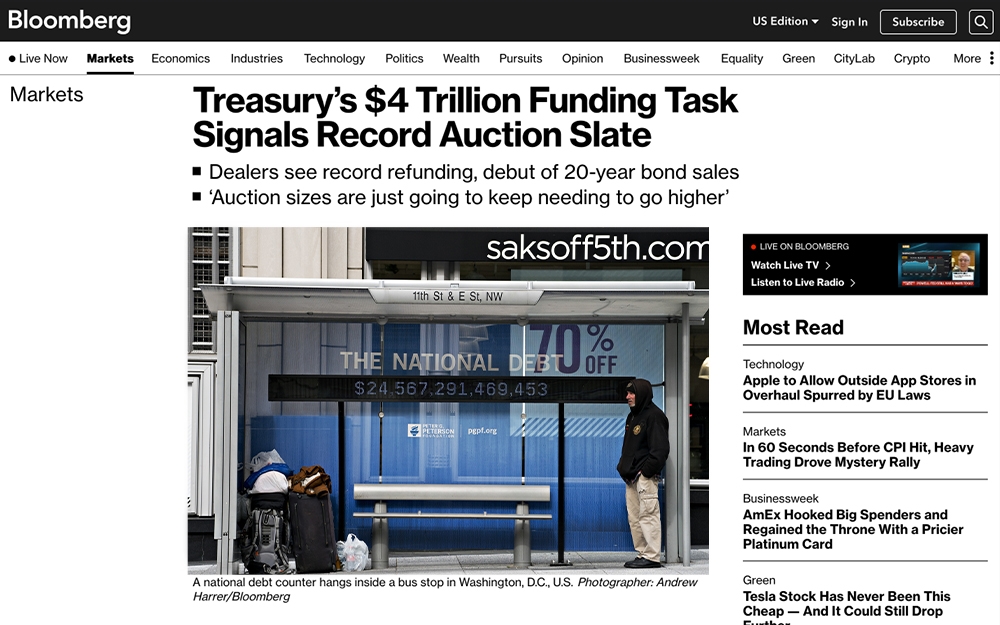 Bloomberg article featuring photograph of bus shelter national debt clock in Washington, D.C.